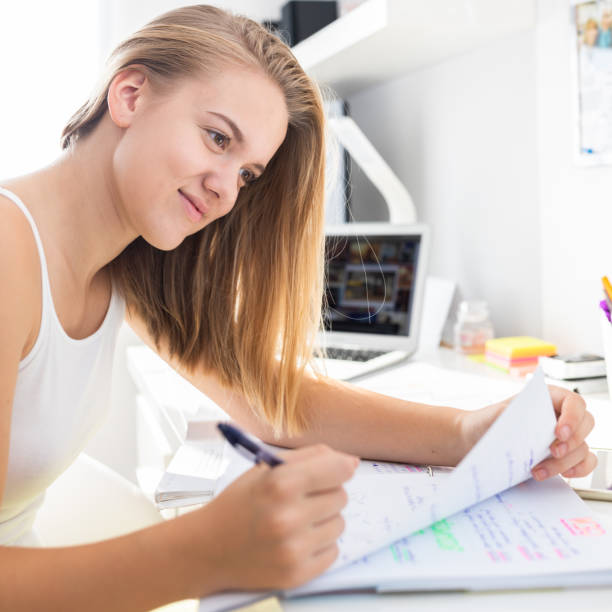 istock Teenage girl studing for school 1179513017