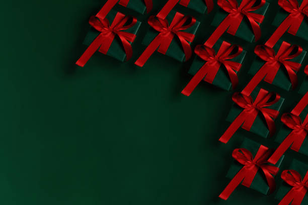 istock Green gift boxes on green background 1179513102