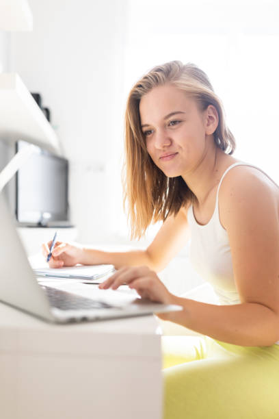 istock Teenage girl studing for school 1179513103
