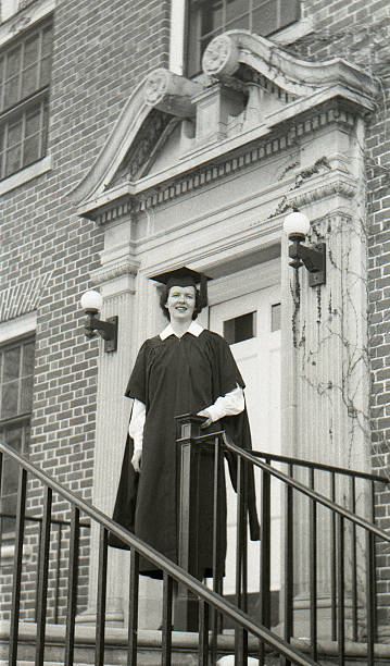 female college graduate 1950, retro Female college graduate 1950. Scanned film with grain. graduation photos stock pictures, royalty-free photos & images
