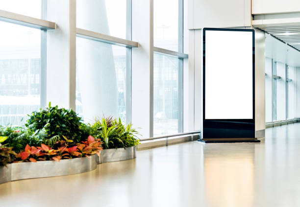 istock Blank poster kiosk in airport corridor 1179515115