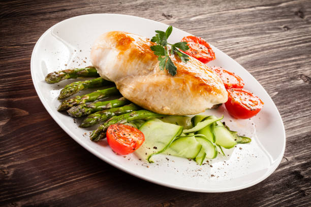 istock Roast chicken breast and vegetables 1179517516