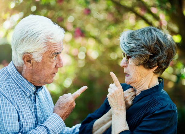 istock Senior couple arguing in a garden 1179517958