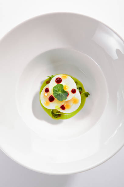 istock Exquisite Serving Scallop in Pesto Sauce with Mozzarella 1179518165