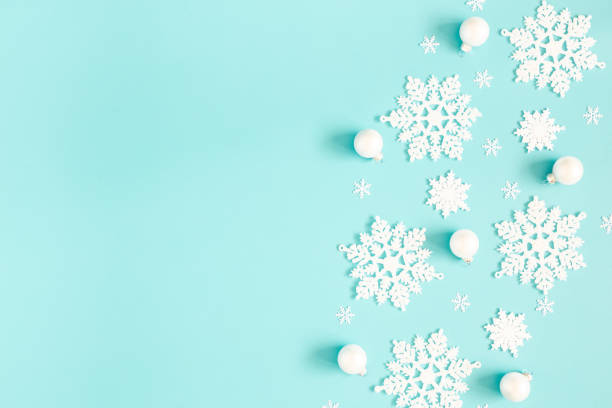 istock Christmas or winter composition. Pattern made of snowflakes on pastel blue background. Christmas, winter, new year concept. Flat lay, top view, copy space 1179519346