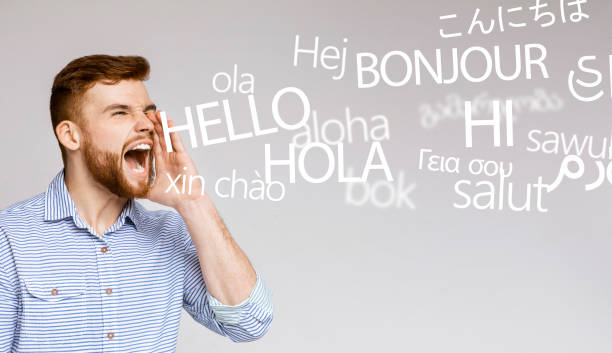istock Crazy emotional man screaming hello in different languages 1179520751