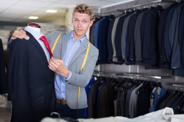istock Seller in business clothes measuring jacket 1179524861