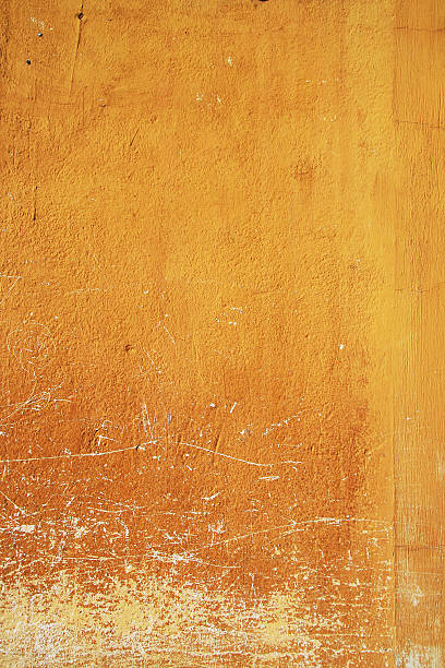 istock Yellow wall texture from old town Antigua in Guatemala 117952555
