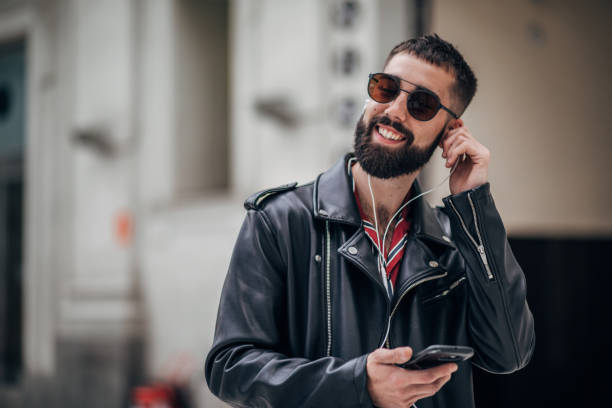 istock Cute guy listening music 1179526896
