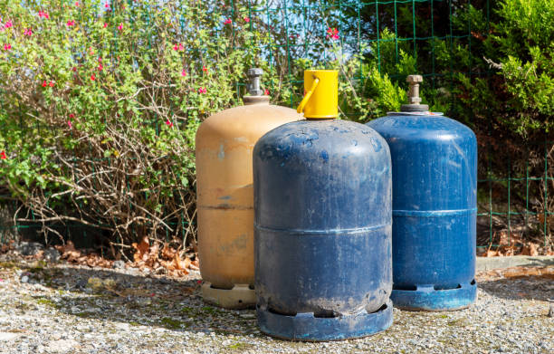 istock three LPG cooking gas cylinders consumers, outdoors 1179528475