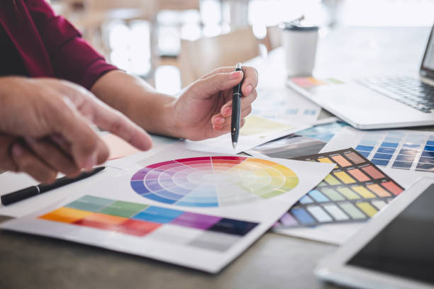 istock Midsection Of Man Working Over Color Swatch At Creative Office 1179532822