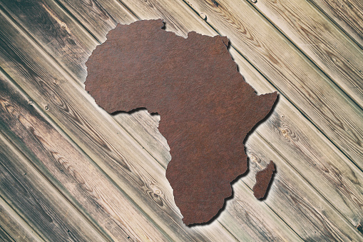 3d rendering of a textured Africa map over a wooden surface