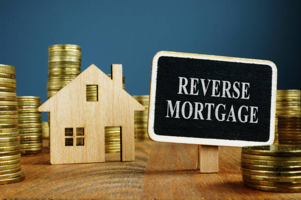 istock Plate with words Reverse mortgage and coins. 1179535885