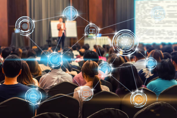 digitales zusammengesetztes bild von menschen auf seminar mit symbolen - khlong toei stock-fotos und bilder