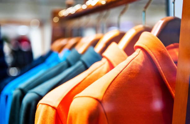 Colorful shirts  in modern clothing store.