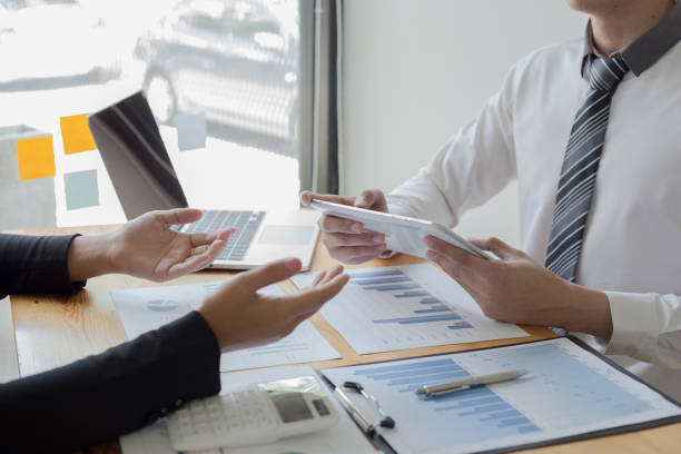 istock Cropped Image Of Business Colleagues Working In Office 1179538405