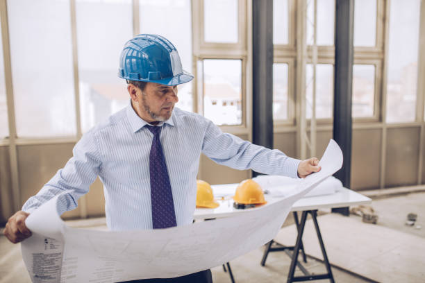 istock The owner checks the apartment project 1179539175
