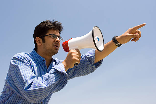 istock Indian youth with a Megaphone 117953960