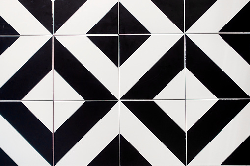 Modern Tile Wall With Black and White Pattern.Black and white ceramic tiles floor.