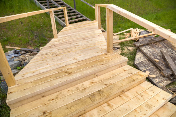 istock New wooden stairs outdoors. Carpenters work. 1179548189