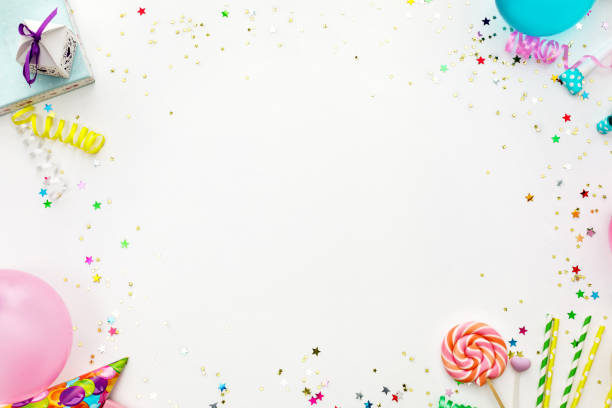 Birthday party background. Birthday party background. party hats, balloons, streamers and confetti with copy space streamer photos stock pictures, royalty-free photos & images