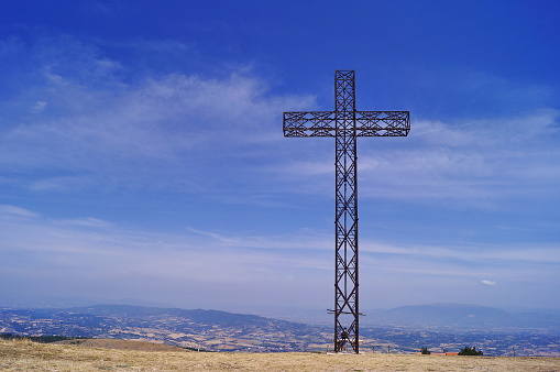 Cross on the top of Mount Martano, Umbria, Italy