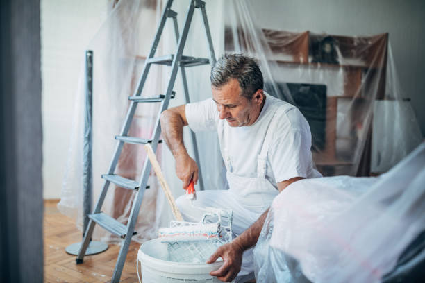 istock Preparing colors to paint walls 1179554923