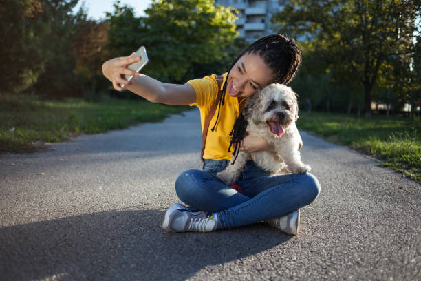 istock Girl taking a selfie with her dog 1179555754