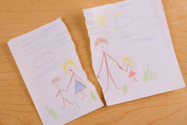 Divorce concept image Divorce concept image. Child family picture turn to pieces battle stock pictures, royalty-free photos & images