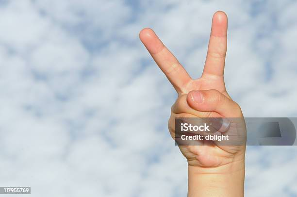 V Sign Stock Photo - Download Image Now - Blue, Child, Close-up