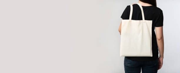 istock Woman Holding Eco Bag With Her Back To Camera, Panorama 1179558947