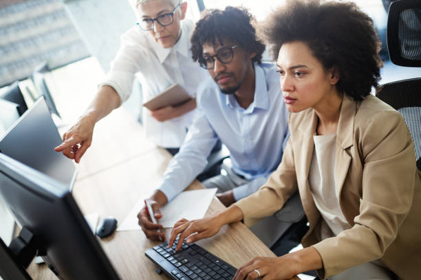 istock Successful business group of people at work in office 1179560514