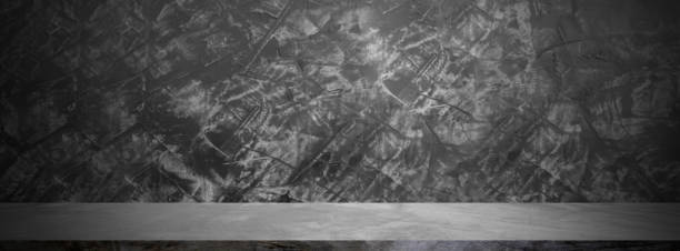 istock dark and black table and shelves  with texture cement wall background 1179560694