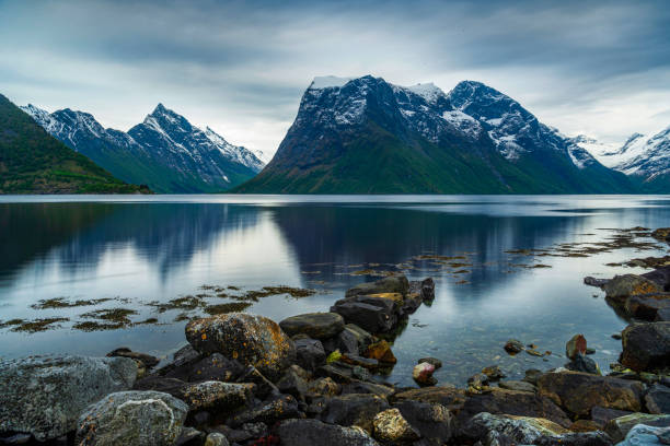 istock landscape inside hjorundfjorden, Norway 1179560725