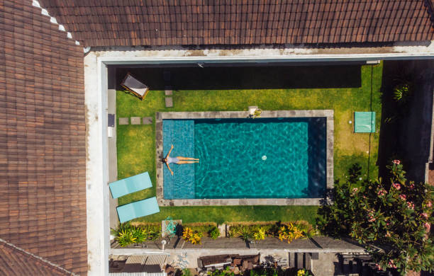 Abstract blur outdoor swimming pool in tropical resort hotel summer background