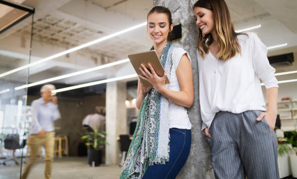 istock Team of colleagues brainstorming together while working in modern office 1179561027