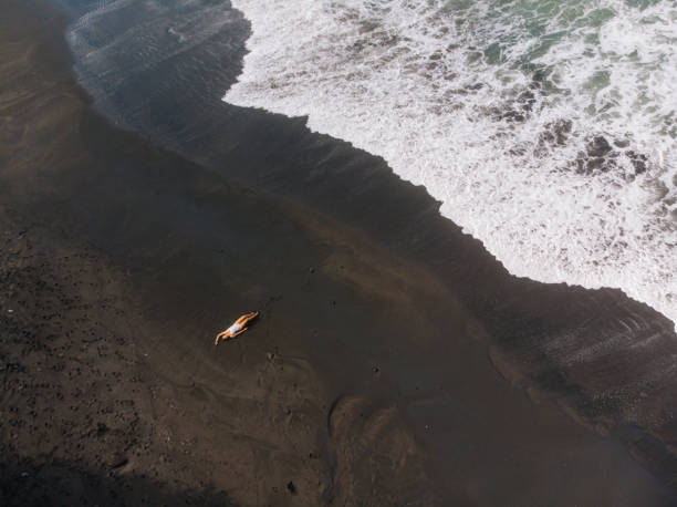 istock Woman relaxing on the tropical beach in Bali 1179561204