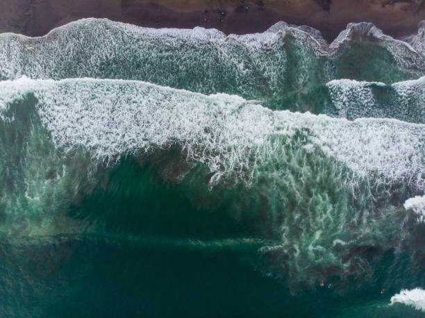 istock Waves splashing along the coastline of Bali 1179562119