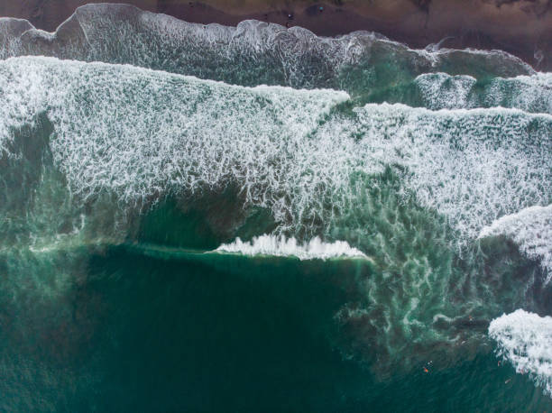 istock Waves splashing along the coastline of Bali 1179562125