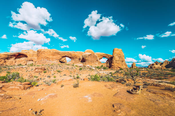 Two natural arches made of sandstone seen in Arches National Park near the city of Moab in Utah, USA.