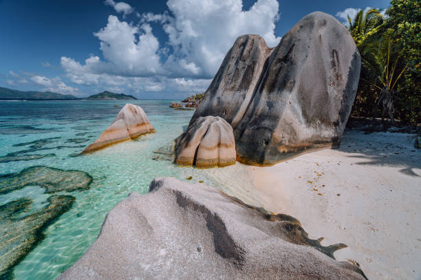istock Famous Anse Source d'Argent. Exotic tropical paradise beach on island La Digue in Seychelles. Huge Granite boulders and blue lagoon 1179562716