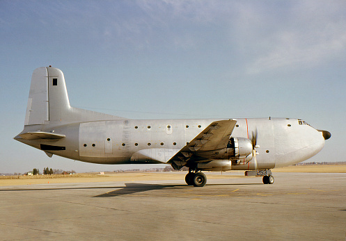 Korean and Vietnam era military cargo plane. Douglas C-124 Globemaster II. Built about 1950, photographed 1964. Kodachrome scanned film with grain.