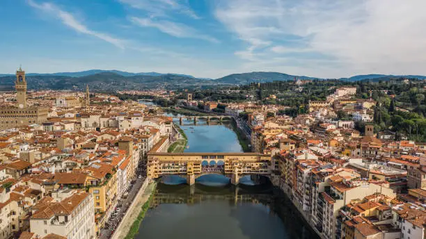 Ponte Vecchio in Florence. Picturesque medieval arched river bridge with Roman origins