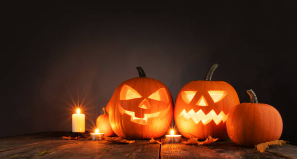 istock Halloween pumpkins and candles 1179571452