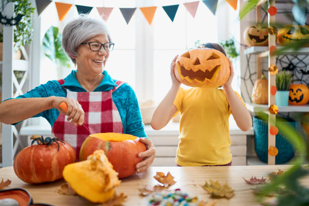 istock family preparing for Halloween 1179573527
