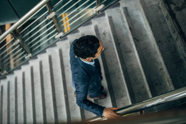 istock Gentleman walking up the steps 1179575298