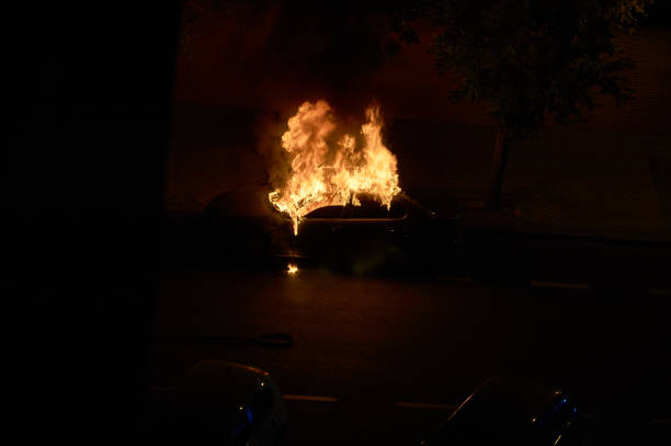 istock A car burning on a street in Madrid 1179577317