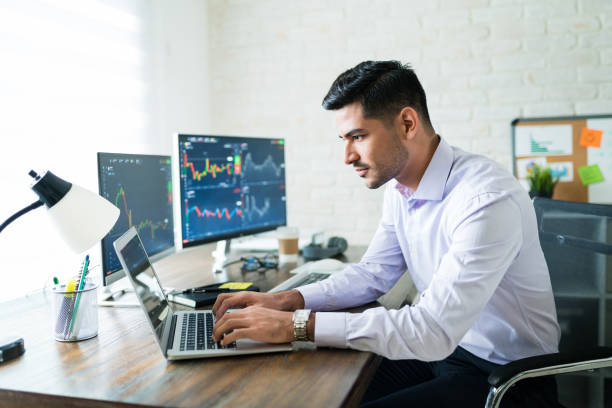 istock Hispanic Finance Professional Making Money Online 1179580489