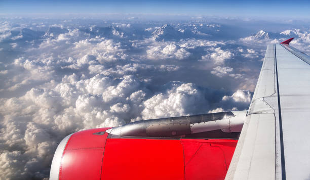 Aerial view of snow capped Himalayan mountains from the aircraft; Dhaulagiri peak (8167 m) is in the center of the frame