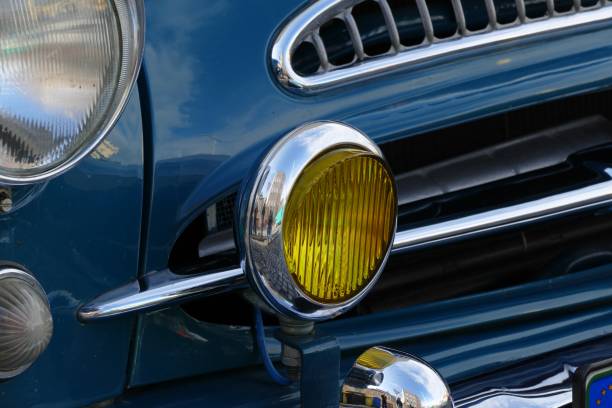 istock classic car headlamp and grill detail 1179582190